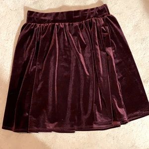 Burgundy elastic waist skirt. Soft velvet material. Stretch fabric. Size xs.